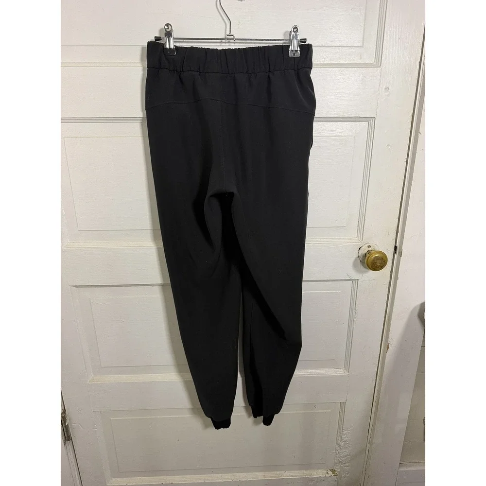 Lululemon On The Fly Jogger Black Luxtreme High Rise Pants Women 7/8 Length - Picture 3 of 4